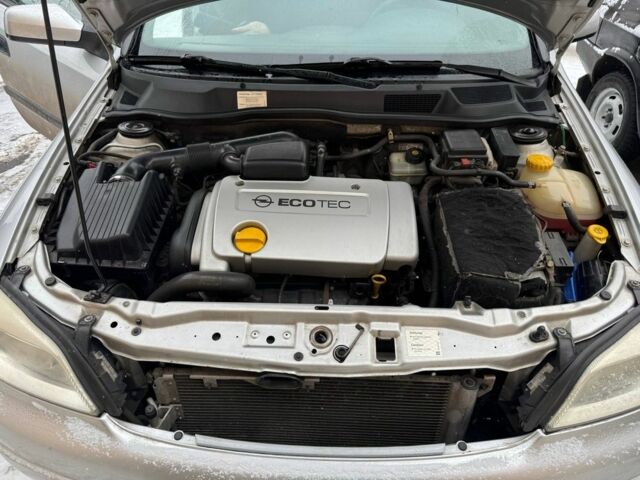 Серый Опель Астра, объемом двигателя 1.4 л и пробегом 253 тыс. км за 3500 $, фото 8 на Automoto.ua