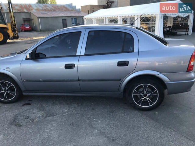 Серый Опель Астра, объемом двигателя 1.4 л и пробегом 254 тыс. км за 3500 $, фото 4 на Automoto.ua