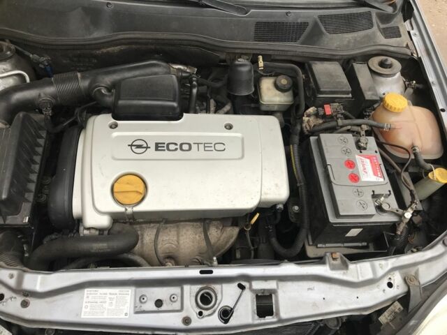 Серый Опель Астра, объемом двигателя 1.4 л и пробегом 254 тыс. км за 3500 $, фото 12 на Automoto.ua