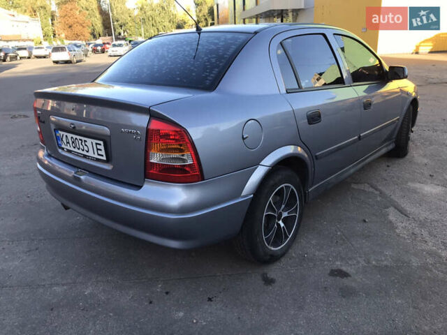 Серый Опель Астра, объемом двигателя 1.4 л и пробегом 254 тыс. км за 3500 $, фото 2 на Automoto.ua