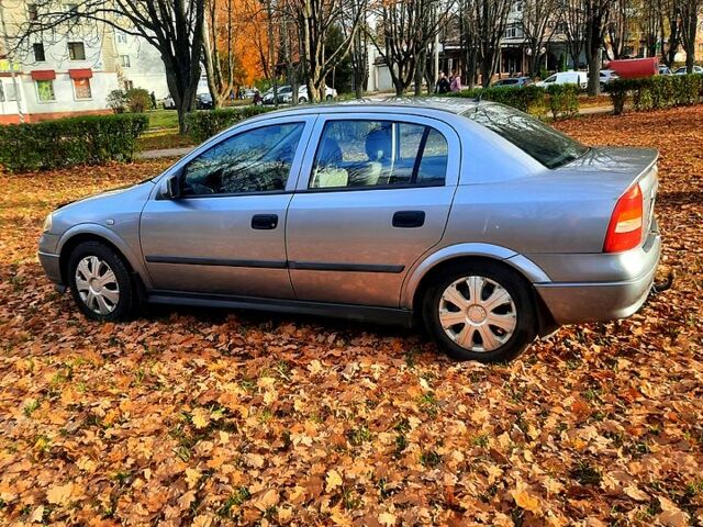 Серый Опель Астра, объемом двигателя 1.6 л и пробегом 174 тыс. км за 3500 $, фото 4 на Automoto.ua