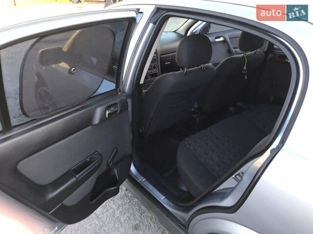 Серый Опель Астра, объемом двигателя 1.4 л и пробегом 254 тыс. км за 3500 $, фото 8 на Automoto.ua