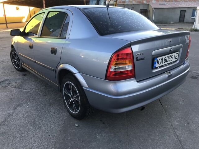 Серый Опель Астра, объемом двигателя 1.4 л и пробегом 254 тыс. км за 3500 $, фото 3 на Automoto.ua