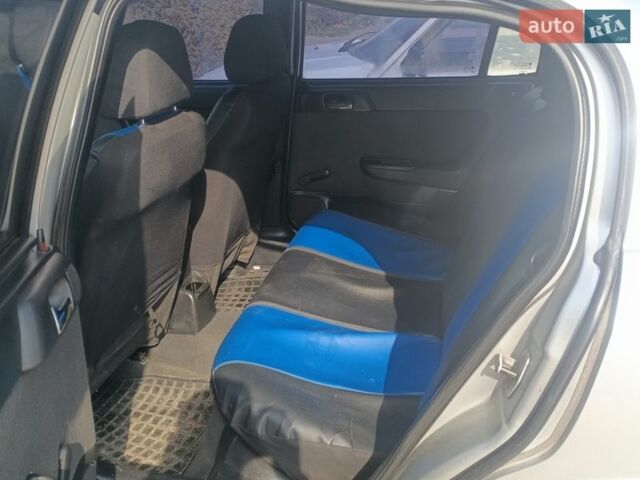 Серый Опель Астра, объемом двигателя 1.6 л и пробегом 230 тыс. км за 2400 $, фото 2 на Automoto.ua