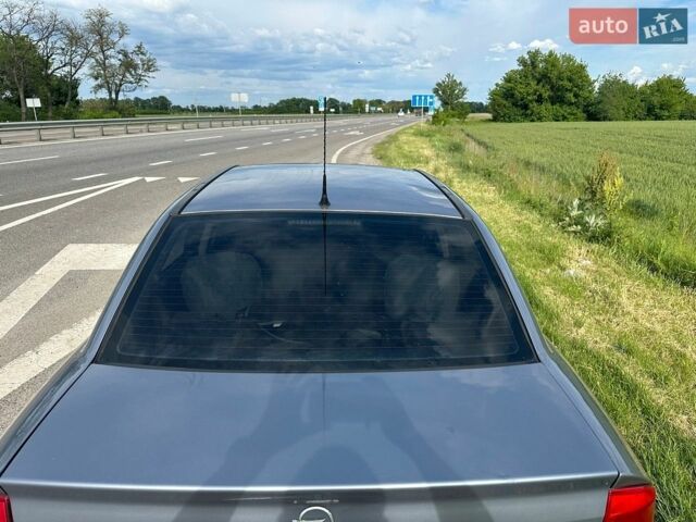 Серый Опель Астра, объемом двигателя 1.6 л и пробегом 303 тыс. км за 3000 $, фото 7 на Automoto.ua
