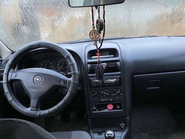 Серый Опель Астра, объемом двигателя 1.4 л и пробегом 160 тыс. км за 2500 $, фото 6 на Automoto.ua