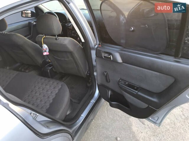 Серый Опель Астра, объемом двигателя 1.4 л и пробегом 254 тыс. км за 3500 $, фото 7 на Automoto.ua