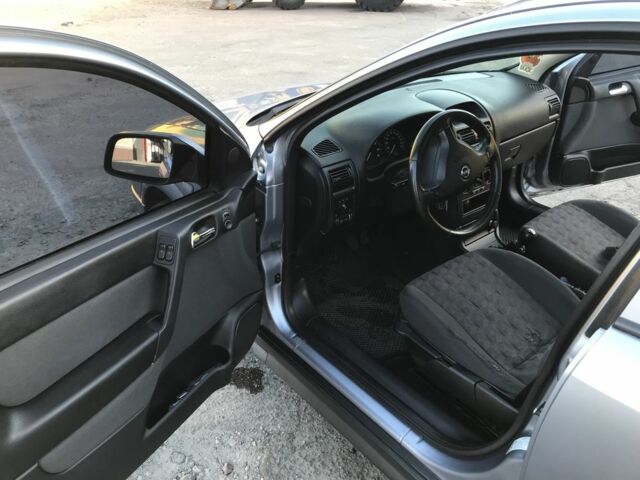 Серый Опель Астра, объемом двигателя 1.4 л и пробегом 254 тыс. км за 3500 $, фото 9 на Automoto.ua