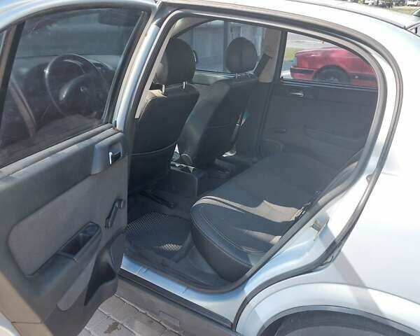 Серый Опель Астра, объемом двигателя 1.6 л и пробегом 302 тыс. км за 3500 $, фото 15 на Automoto.ua