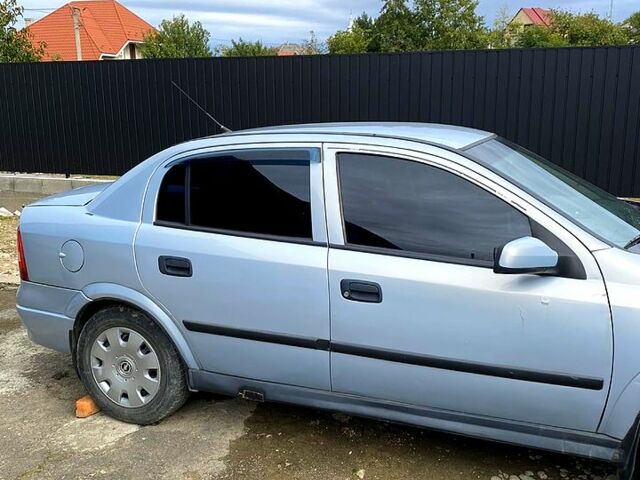 Серый Опель Астра, объемом двигателя 1.4 л и пробегом 264 тыс. км за 2500 $, фото 4 на Automoto.ua