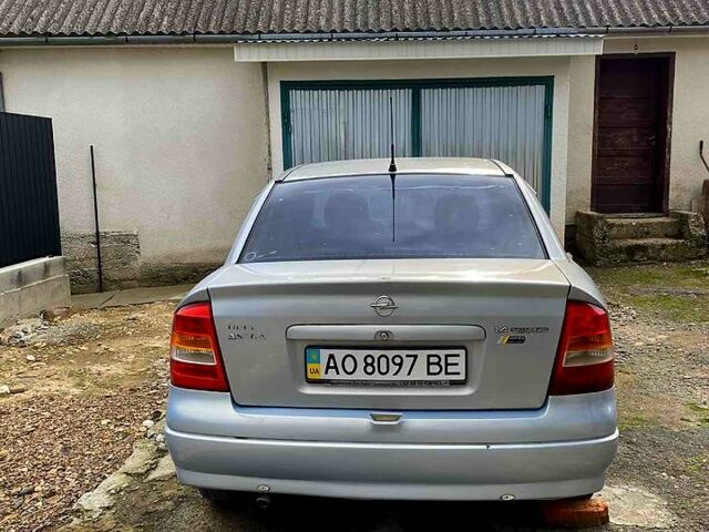 Серый Опель Астра, объемом двигателя 1.4 л и пробегом 264 тыс. км за 2500 $, фото 5 на Automoto.ua