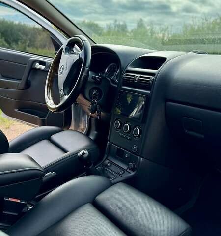 Серый Опель Астра, объемом двигателя 1.6 л и пробегом 148 тыс. км за 4500 $, фото 4 на Automoto.ua