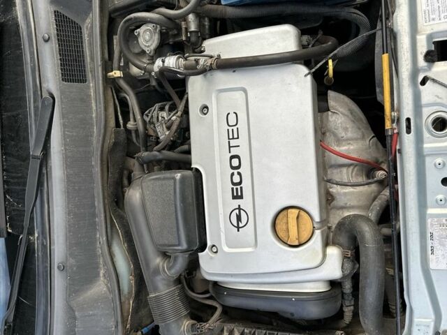 Серый Опель Астра, объемом двигателя 1.6 л и пробегом 140 тыс. км за 3999 $, фото 9 на Automoto.ua