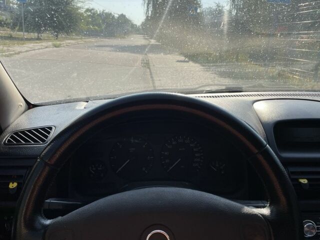 Сірий Опель Астра, об'ємом двигуна 1.6 л та пробігом 300 тис. км за 2600 $, фото 4 на Automoto.ua