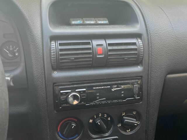 Сірий Опель Астра, об'ємом двигуна 1.4 л та пробігом 215 тис. км за 2700 $, фото 4 на Automoto.ua