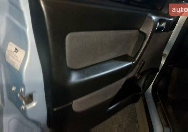 Серый Опель Астра, объемом двигателя 1.39 л и пробегом 200 тыс. км за 3300 $, фото 5 на Automoto.ua