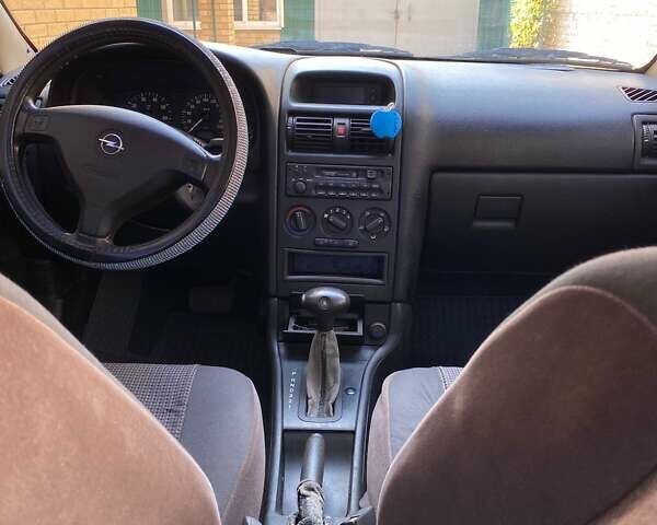 Сірий Опель Астра, об'ємом двигуна 1.6 л та пробігом 153 тис. км за 4000 $, фото 24 на Automoto.ua