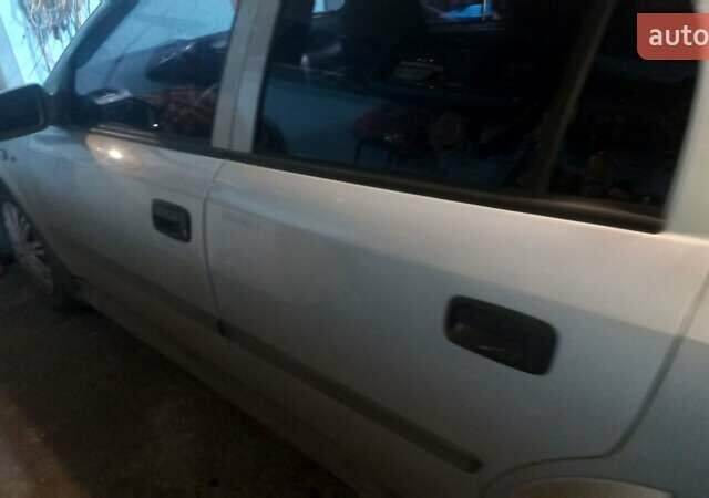 Серый Опель Астра, объемом двигателя 1.39 л и пробегом 200 тыс. км за 3300 $, фото 3 на Automoto.ua