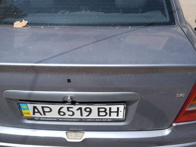 Серый Опель Астра, объемом двигателя 1.6 л и пробегом 231 тыс. км за 3000 $, фото 3 на Automoto.ua