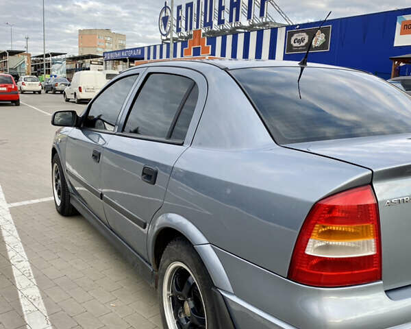 Сірий Опель Астра, об'ємом двигуна 1.6 л та пробігом 245 тис. км за 4200 $, фото 4 на Automoto.ua