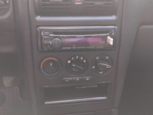 Серый Опель Астра, объемом двигателя 1.6 л и пробегом 248 тыс. км за 3200 $, фото 7 на Automoto.ua