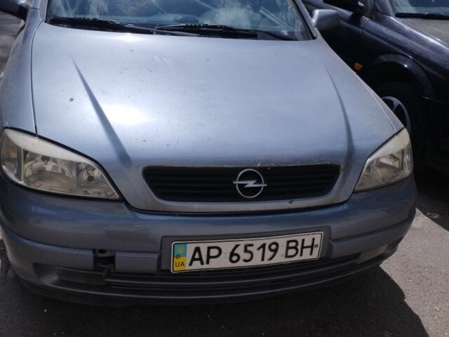 Серый Опель Астра, объемом двигателя 1.6 л и пробегом 231 тыс. км за 3000 $, фото 2 на Automoto.ua