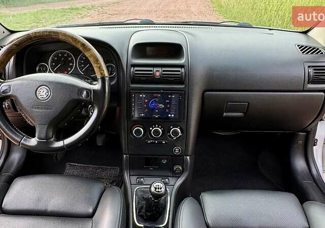 Серый Опель Астра, объемом двигателя 1.6 л и пробегом 148 тыс. км за 4500 $, фото 5 на Automoto.ua