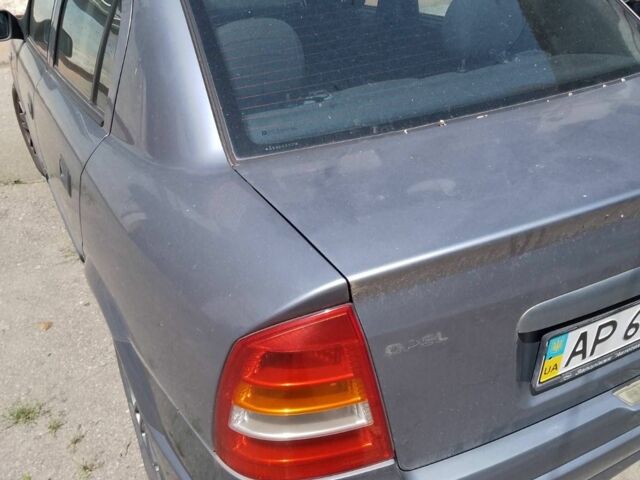 Серый Опель Астра, объемом двигателя 1.6 л и пробегом 231 тыс. км за 3000 $, фото 9 на Automoto.ua