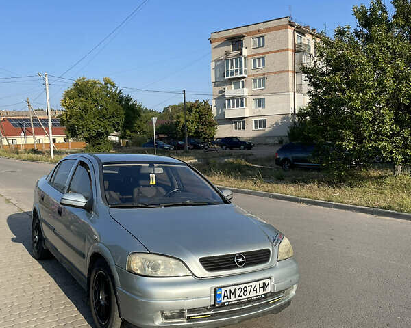 Серый Опель Астра, объемом двигателя 1.6 л и пробегом 300 тыс. км за 2600 $, фото 4 на Automoto.ua