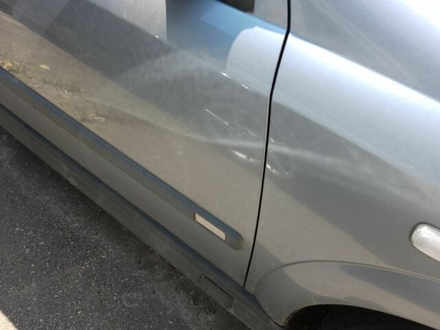 Серый Опель Астра, объемом двигателя 1.6 л и пробегом 231 тыс. км за 3000 $, фото 5 на Automoto.ua