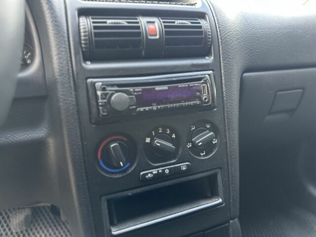 Серый Опель Астра, объемом двигателя 1.6 л и пробегом 140 тыс. км за 3999 $, фото 7 на Automoto.ua