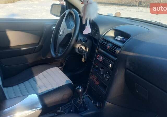 Опель Астра 2004 в Житомире на Automoto.ua Серый Опель Астра, объемом двигателя 1.4 л и пробегом 225 тыс. км за 3300 $, фото 50 на Automoto.ua