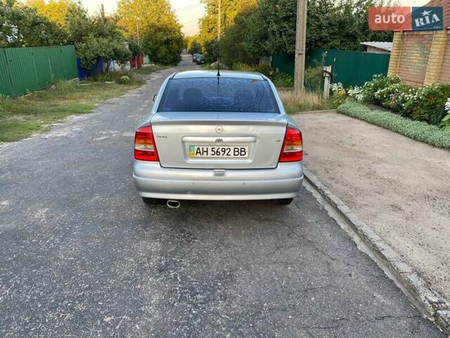 Сірий Опель Астра, об'ємом двигуна 1.6 л та пробігом 153 тис. км за 4000 $, фото 6 на Automoto.ua