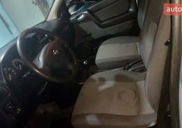 Серый Опель Астра, объемом двигателя 1.39 л и пробегом 200 тыс. км за 3300 $, фото 4 на Automoto.ua