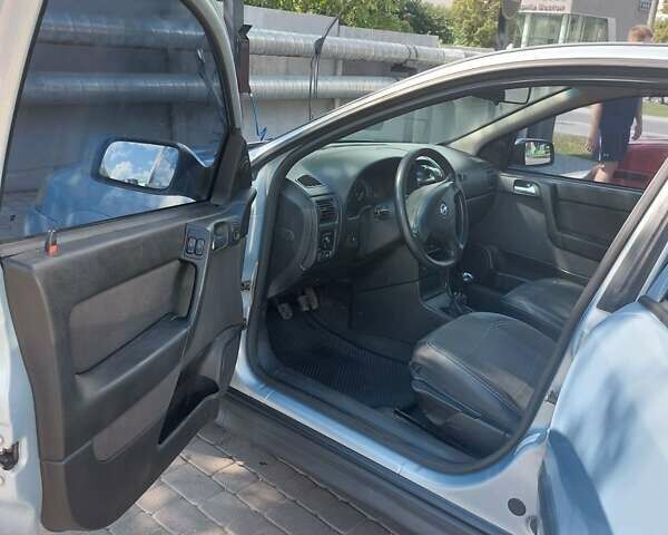 Серый Опель Астра, объемом двигателя 1.6 л и пробегом 302 тыс. км за 3500 $, фото 14 на Automoto.ua