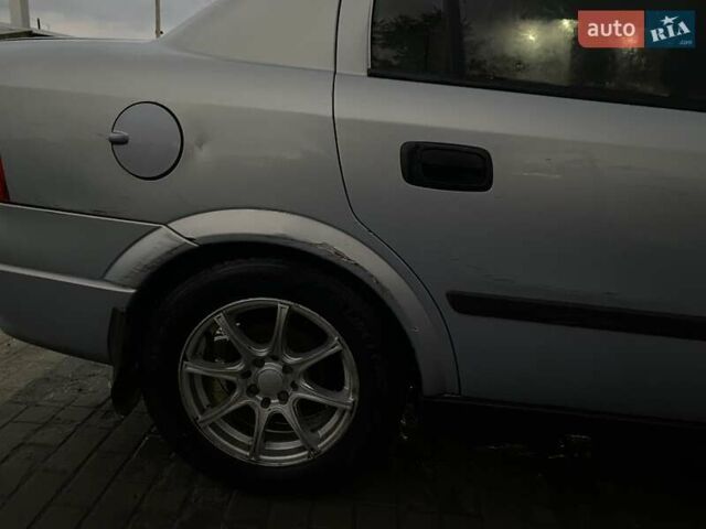 Серый Опель Астра, объемом двигателя 1.4 л и пробегом 300 тыс. км за 3200 $, фото 8 на Automoto.ua