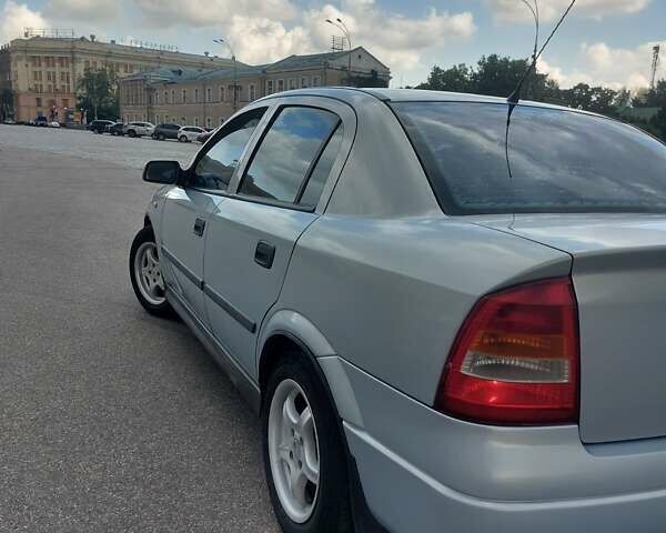 Серый Опель Астра, объемом двигателя 1.6 л и пробегом 302 тыс. км за 3500 $, фото 6 на Automoto.ua