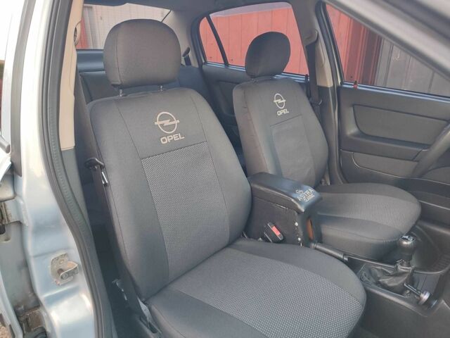 Серый Опель Астра, объемом двигателя 1.4 л и пробегом 180 тыс. км за 6400 $, фото 11 на Automoto.ua