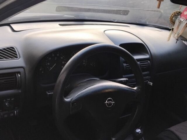 Серый Опель Астра, объемом двигателя 1.6 л и пробегом 248 тыс. км за 3200 $, фото 4 на Automoto.ua