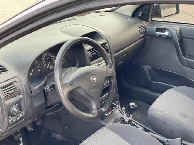 Серый Опель Астра, объемом двигателя 1.6 л и пробегом 250 тыс. км за 3300 $, фото 6 на Automoto.ua