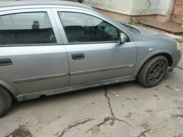 Серый Опель Астра, объемом двигателя 1.6 л и пробегом 231 тыс. км за 3000 $, фото 13 на Automoto.ua