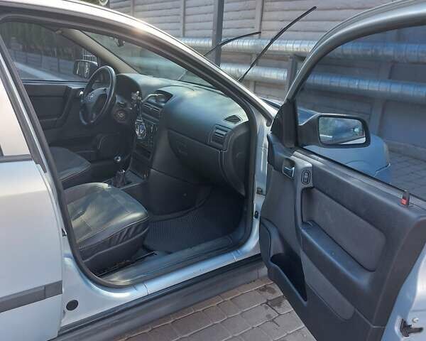 Серый Опель Астра, объемом двигателя 1.6 л и пробегом 302 тыс. км за 3500 $, фото 19 на Automoto.ua