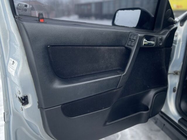 Серый Опель Астра, объемом двигателя 1.4 л и пробегом 320 тыс. км за 2999 $, фото 4 на Automoto.ua