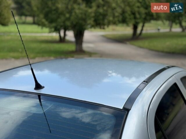 Серый Опель Астра, объемом двигателя 1.4 л и пробегом 228 тыс. км за 2899 $, фото 15 на Automoto.ua