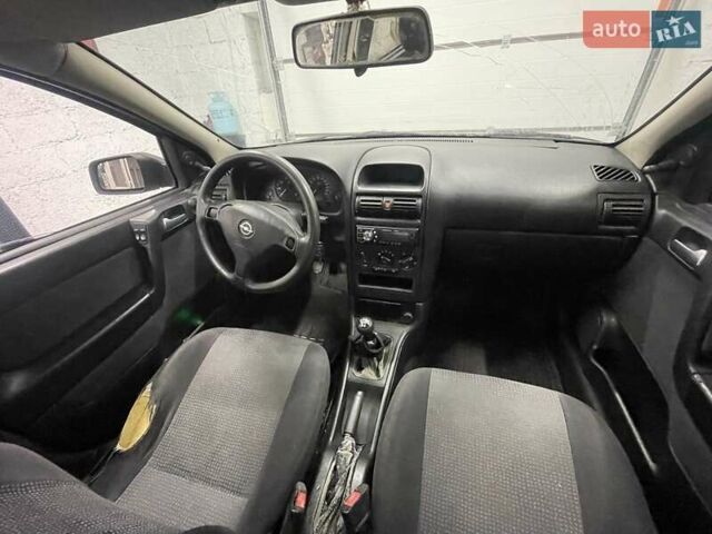 Серый Опель Астра, объемом двигателя 1.6 л и пробегом 218 тыс. км за 2100 $, фото 4 на Automoto.ua