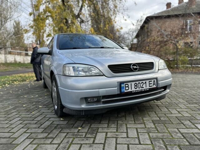 Серый Опель Астра, объемом двигателя 1.6 л и пробегом 140 тыс. км за 3999 $, фото 1 на Automoto.ua