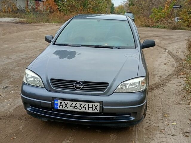 Серый Опель Астра, объемом двигателя 1.4 л и пробегом 210 тыс. км за 3200 $, фото 3 на Automoto.ua