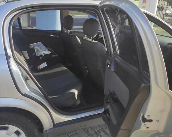 Серый Опель Астра, объемом двигателя 1.39 л и пробегом 242 тыс. км за 3800 $, фото 21 на Automoto.ua