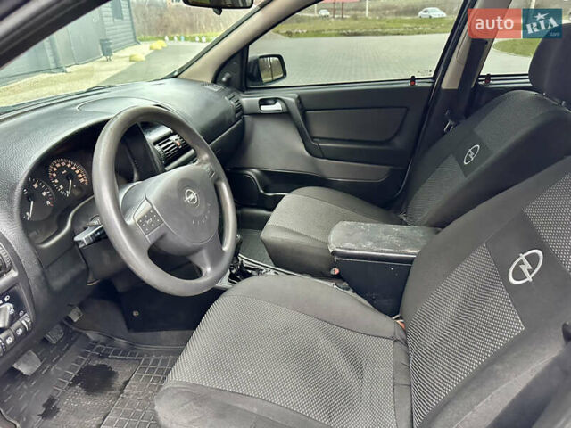 Серый Опель Астра, объемом двигателя 1.39 л и пробегом 240 тыс. км за 2800 $, фото 5 на Automoto.ua