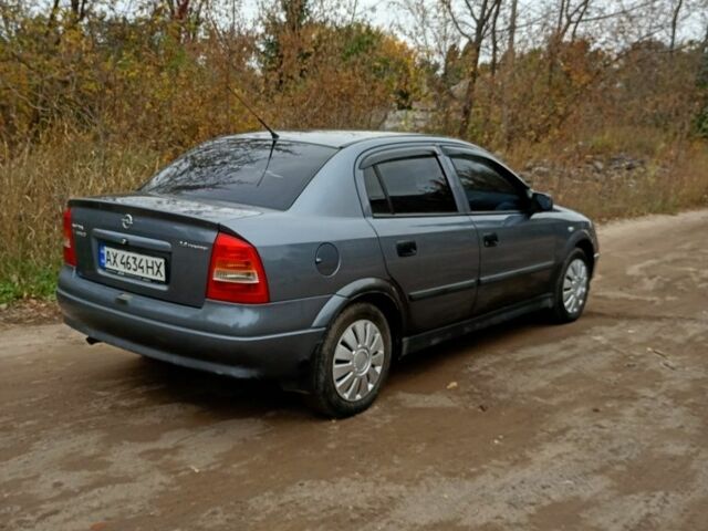 Серый Опель Астра, объемом двигателя 1.4 л и пробегом 210 тыс. км за 3200 $, фото 6 на Automoto.ua